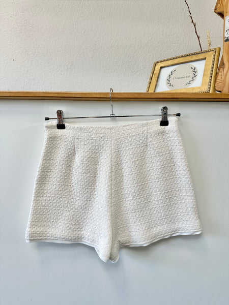 Short jupe en tweed beige