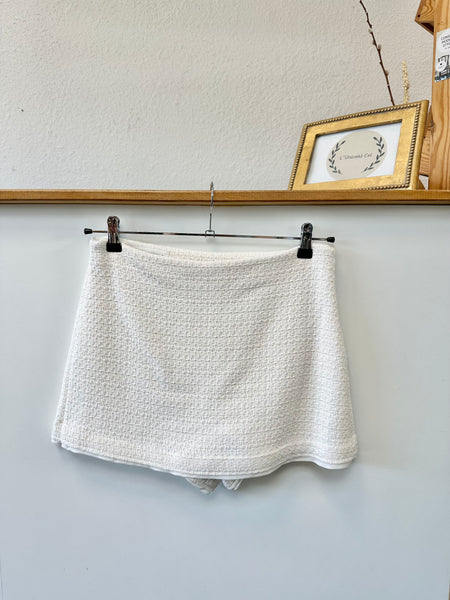 Short jupe en tweed beige